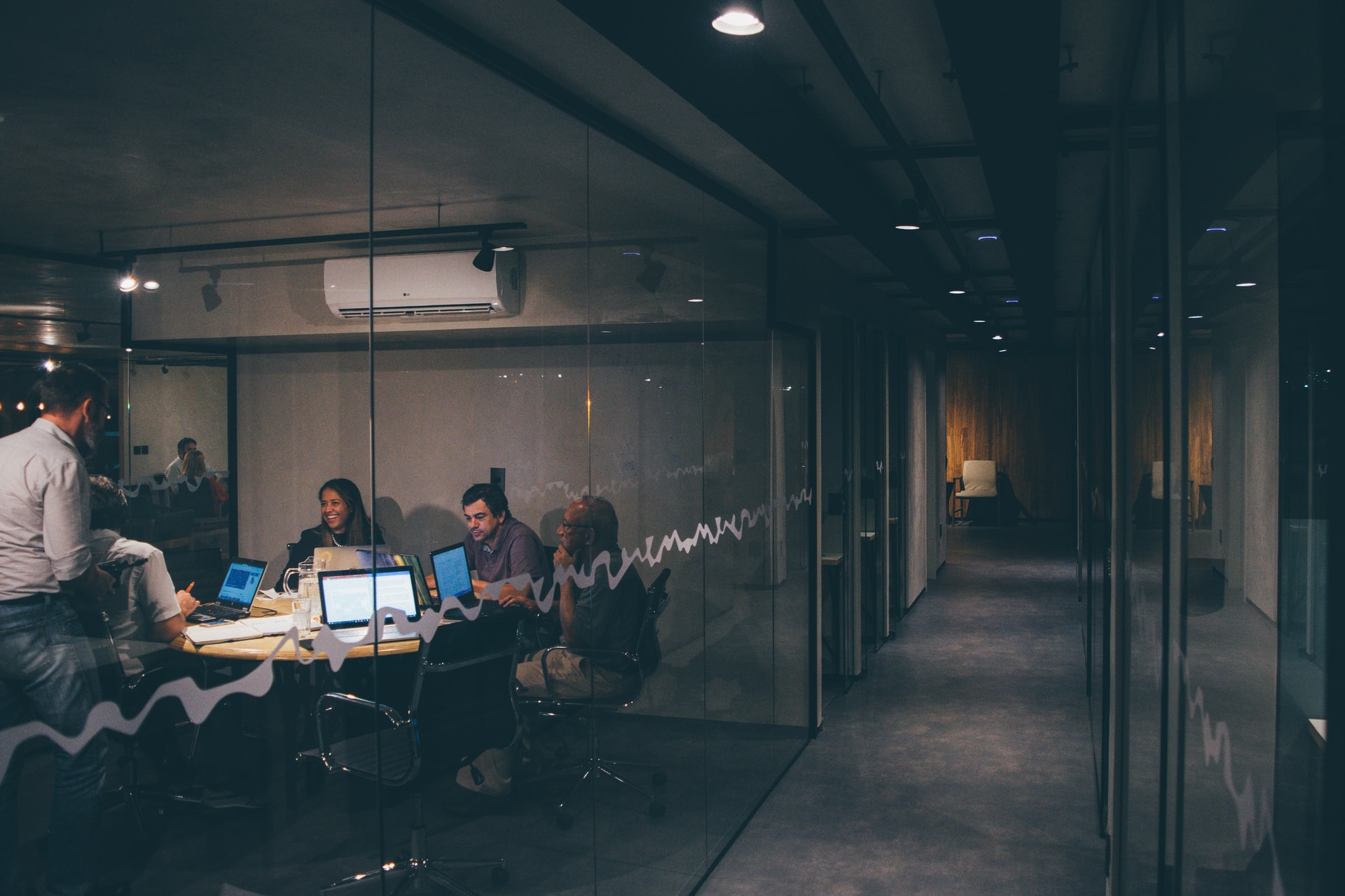 Team collaborating around a table in a modern office